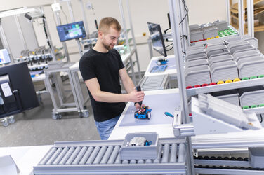 Photo of a manual assembly of a demonstration product at a workstation in the lean lab.