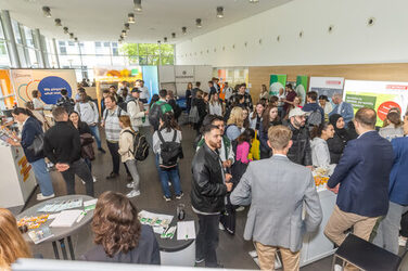 Students interact with employers at the Business Event 2023.