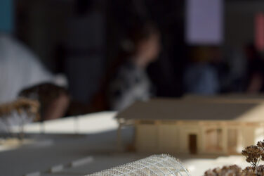 Detailed view of a greenhouse model with a round roof.