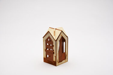 Von Studierenden entwickelter Award, welcher die vielen Facetten der Architektur durch vier unterschiedliche, im 3D-Druck und aus Holz gestalteten Seiten darstellt