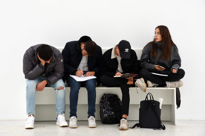 People sitting on a bench.