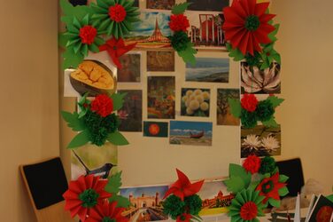 A colorful frame at the Bangladesh cultural stand with pictures of the country