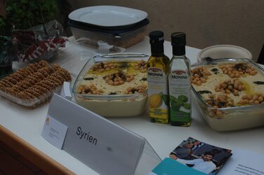 Cultural stand Syria: Food on a decorated table