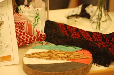 Close-up of the decorated table at the Palestinian cultural stand.