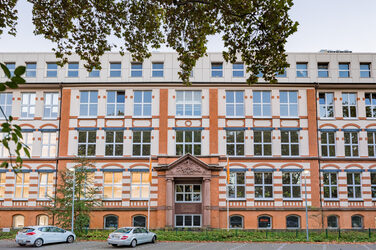 Photograph of the old building on Sonnenstrasse. Frontal view.