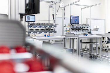 View of the lean laboratory with various manual workstations.