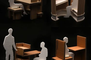 Collage shows four student models of room-forming desks made of cardboard against a black background.