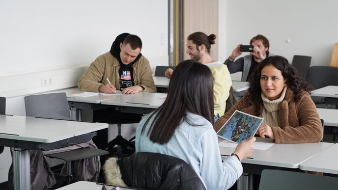 Photo of pupils doing an exercise during the social work taster day.