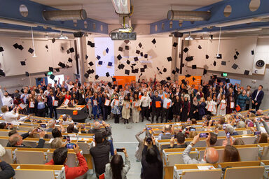 Traditional hat toss of the graduates at the graduation ceremony 2025 of the Department of Computer Science