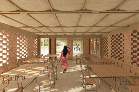 Digital representation of the design of a school building in the middle of a wooded, tropical area.