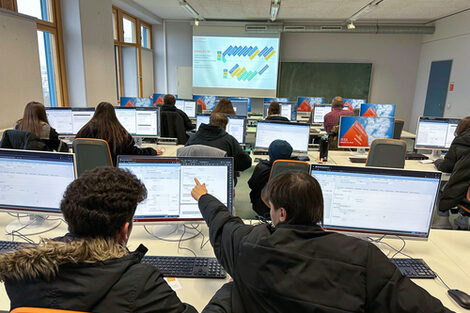 Pupils work on the computers in the computer pool during the ERP internship