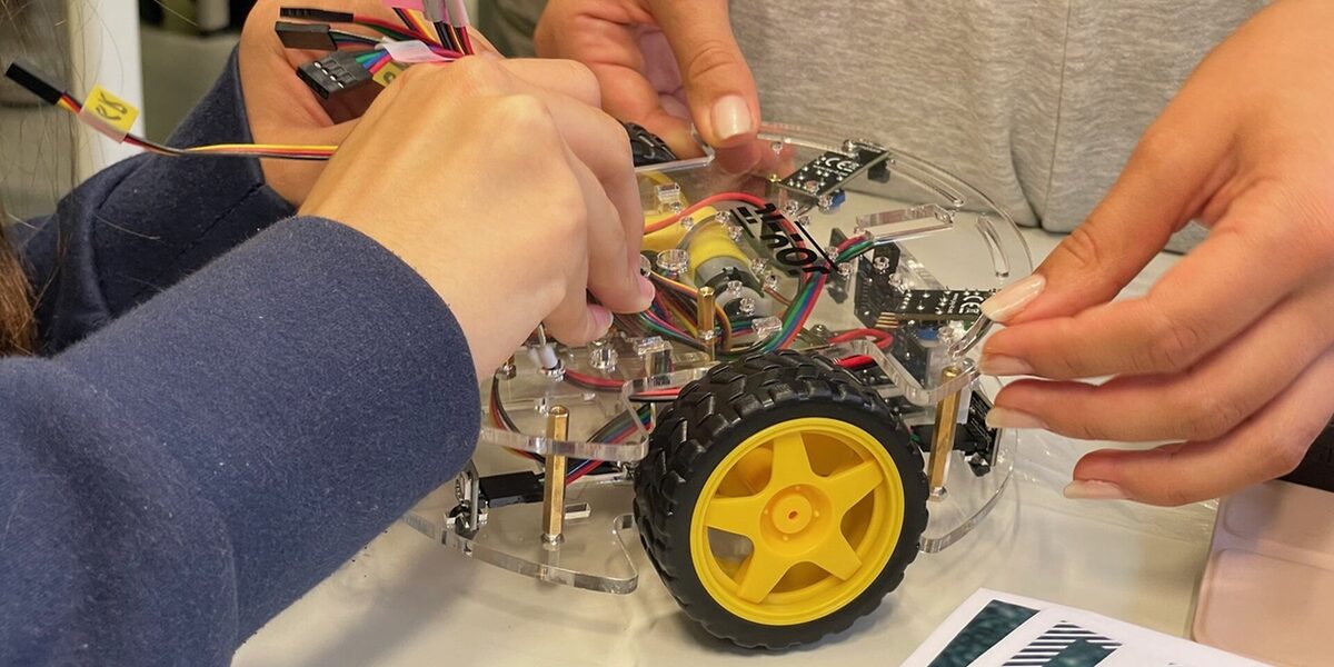Pupils build a model car.