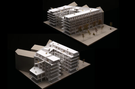 Architekturmodell, welches in der Mitte auseinander gezogen ist, sodass man einen Blick in die innere Gebäudestruktur, sowie den überdachten Innenhof erhält.